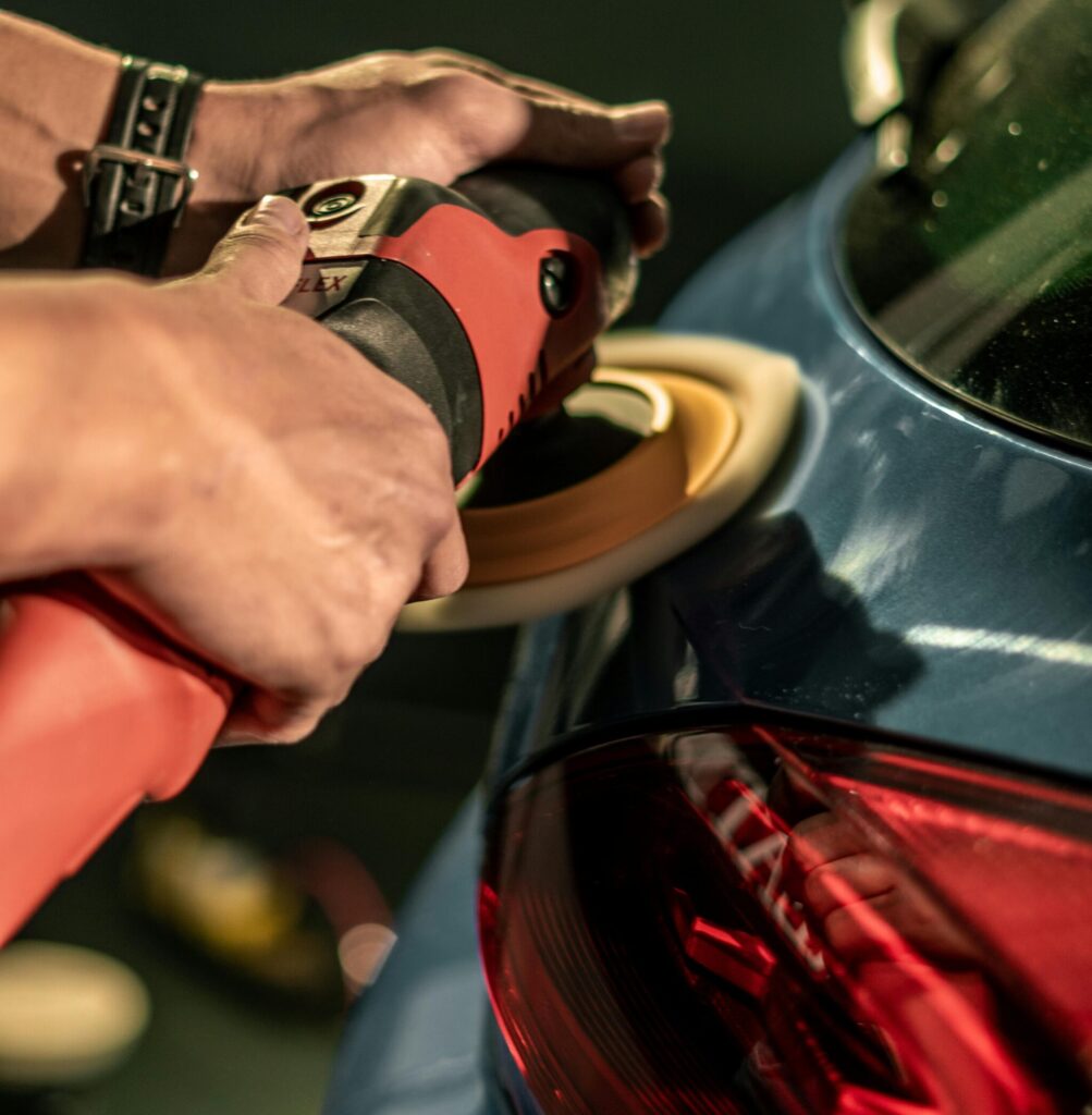 a car getting detailed with a machine professionally in Australia's hard climate