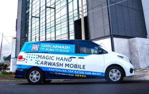 Magic Mobile Van is waiting in front of City building for washing a customer car in Melbourne